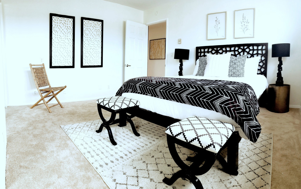 Geräumiges Gästezimmer ohne Kamin mit beiger Wandfarbe, Teppichboden und beigem Boden in Los Angeles