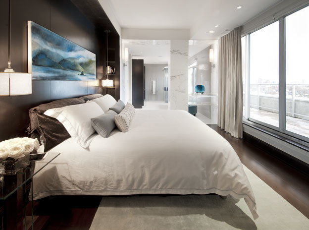 Design ideas for a medium sized contemporary master bedroom in Ottawa with white walls and dark hardwood flooring.