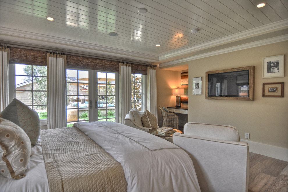 Inspiration for a coastal bedroom remodel in Los Angeles with beige walls