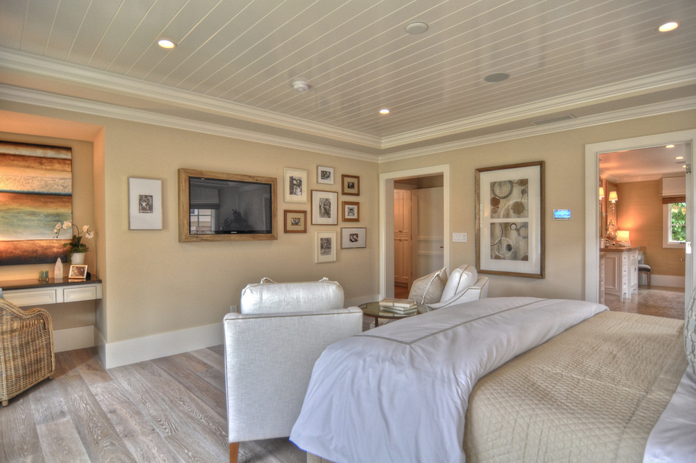 Example of a beach style bedroom design in Los Angeles with beige walls