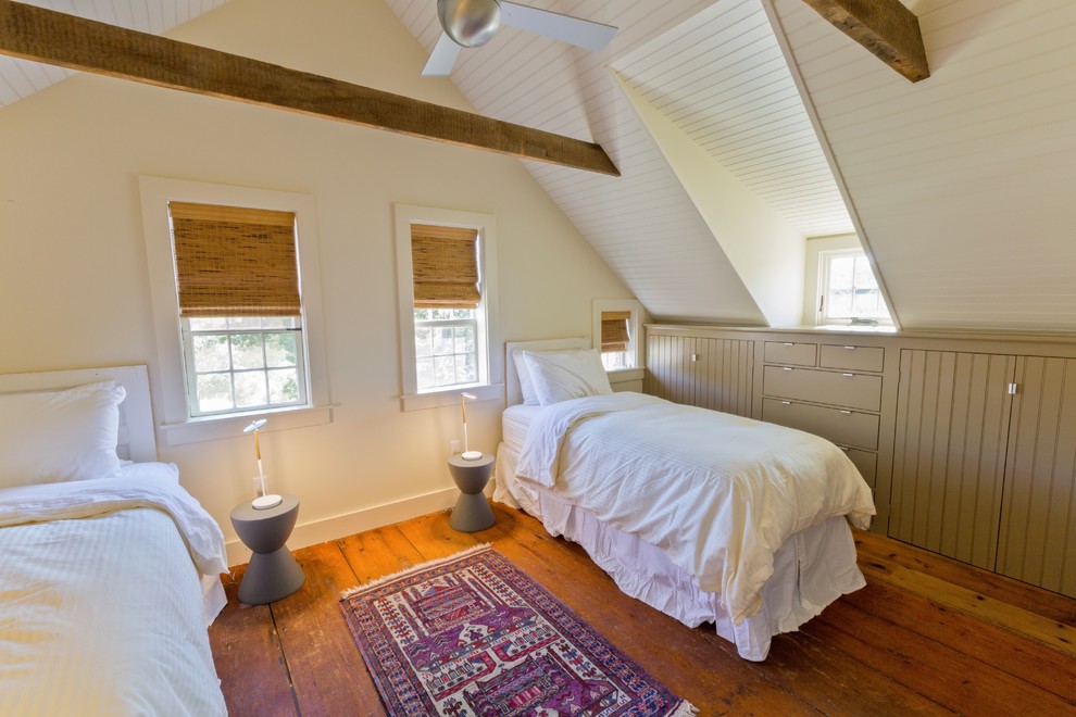 Bedroom - guest medium tone wood floor bedroom idea in Boston with beige walls