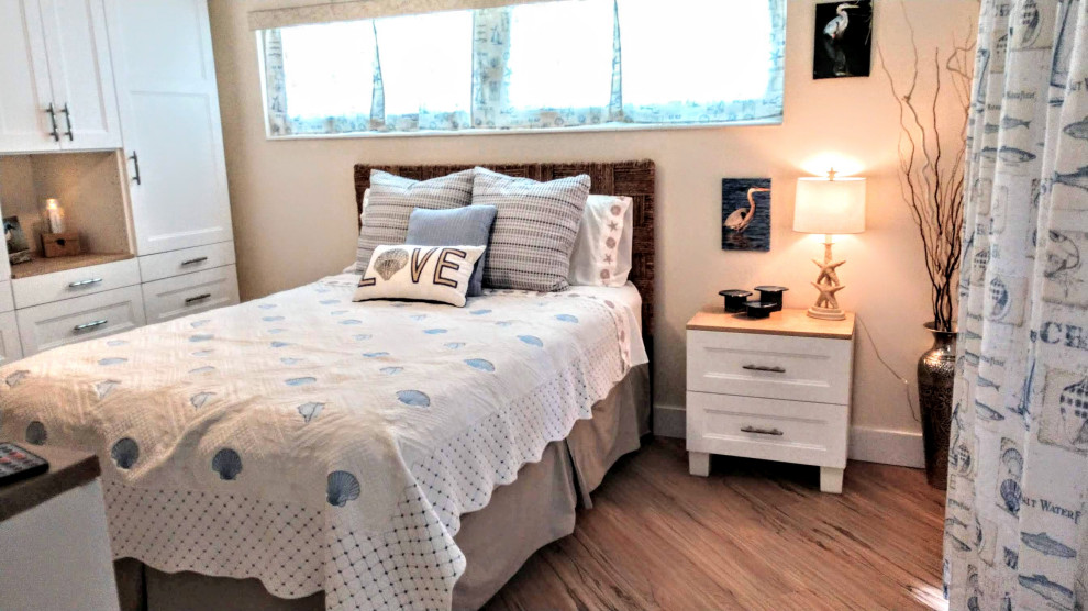 Photo of a coastal bedroom in Orlando.