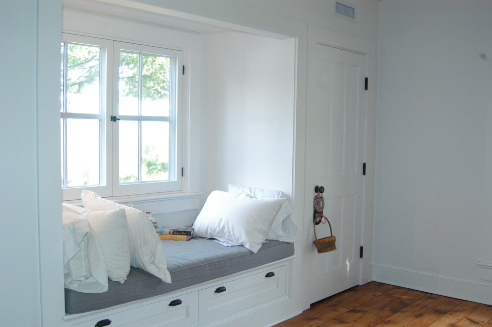 Example of a country bedroom design in Boston