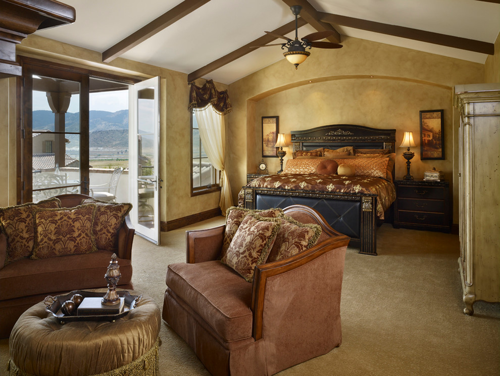 Example of a tuscan bedroom design in Denver