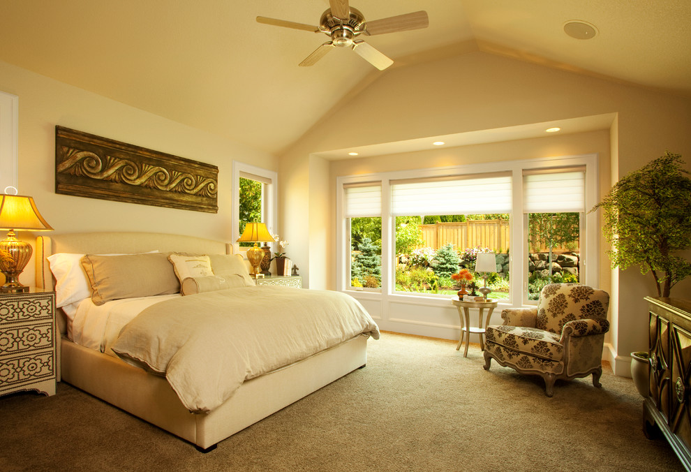 Inspiration for a classic bedroom in Portland with beige walls and carpet.