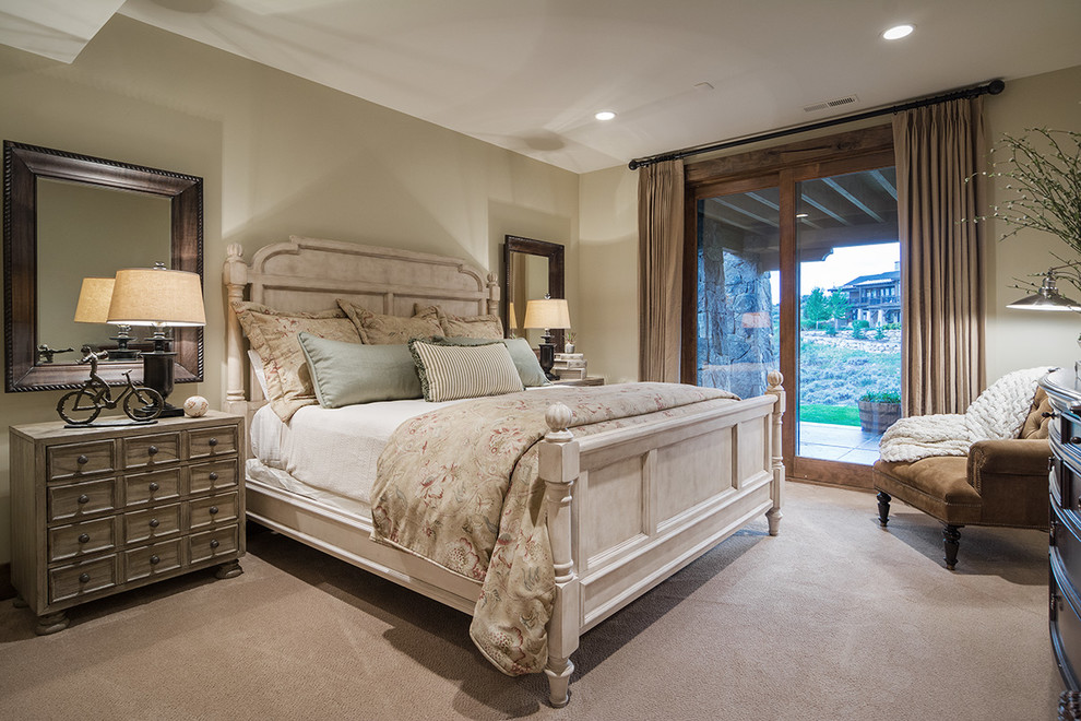 Mountain style carpeted bedroom photo in Salt Lake City with beige walls