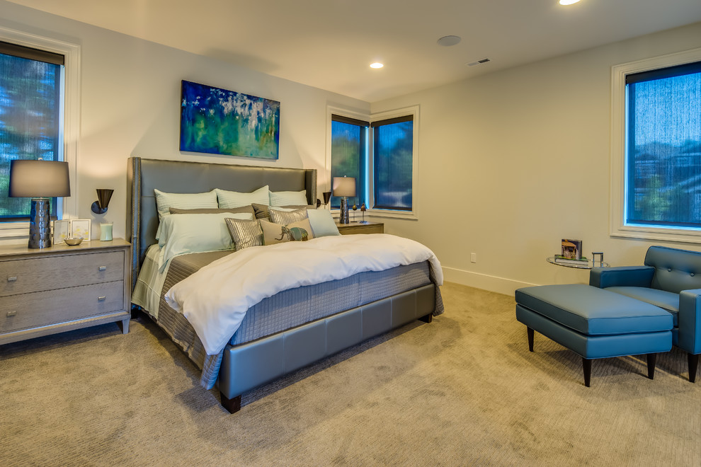 Bedroom - large contemporary guest carpeted bedroom idea in Portland with beige walls and no fireplace