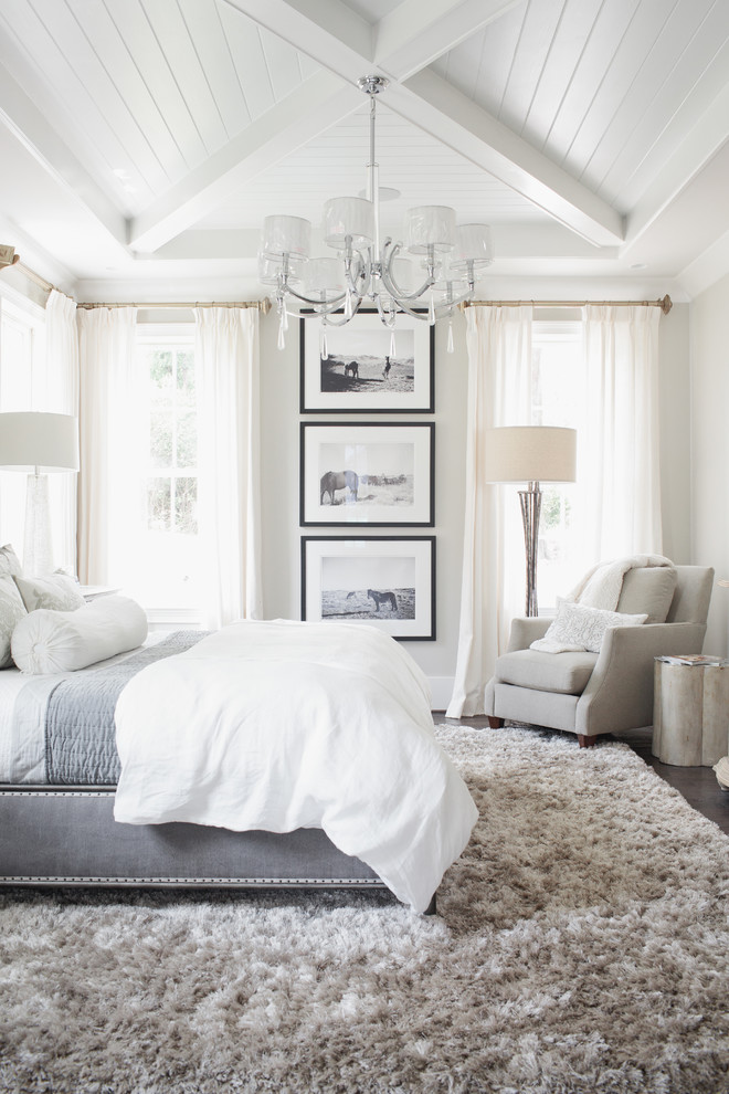 Example of a transitional bedroom design in Birmingham with gray walls