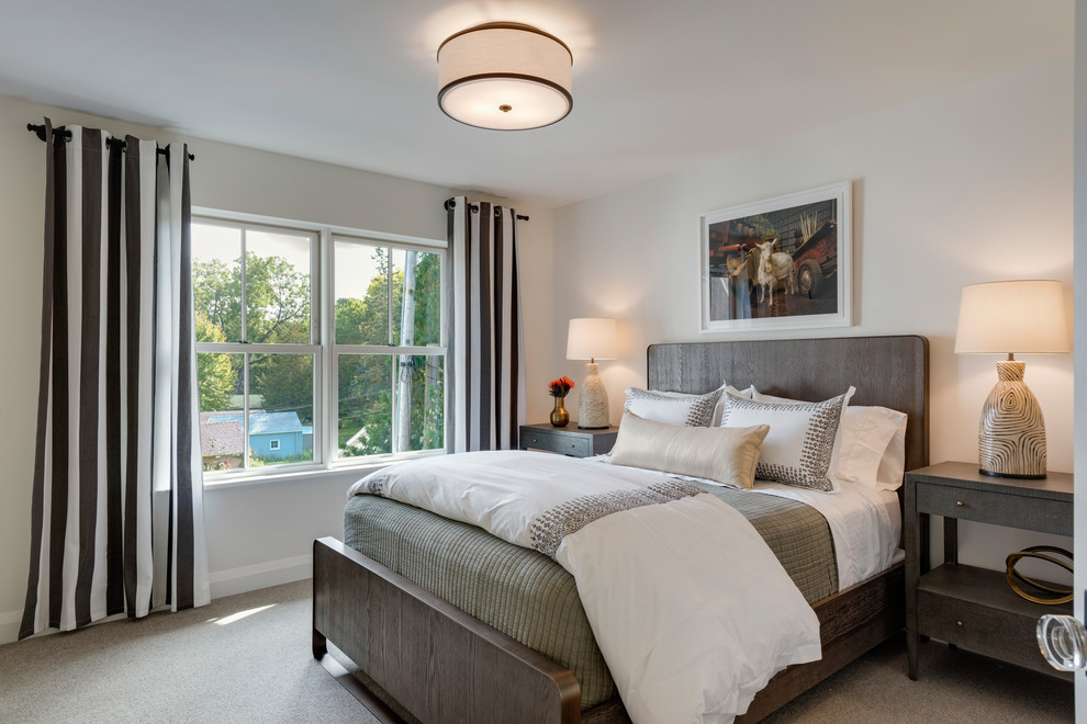 Imagen de habitación de invitados clásica renovada de tamaño medio sin chimenea con paredes beige, moqueta y suelo gris