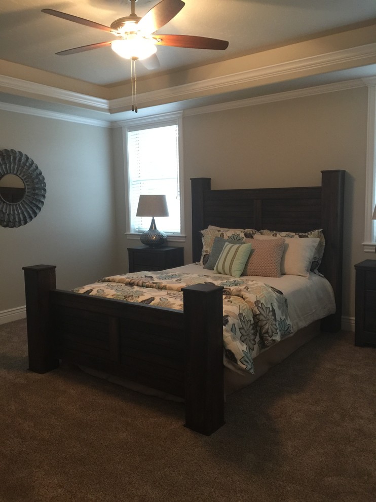 Medium sized rustic master and grey and silver bedroom in Boise with grey walls, carpet, no fireplace and beige floors.