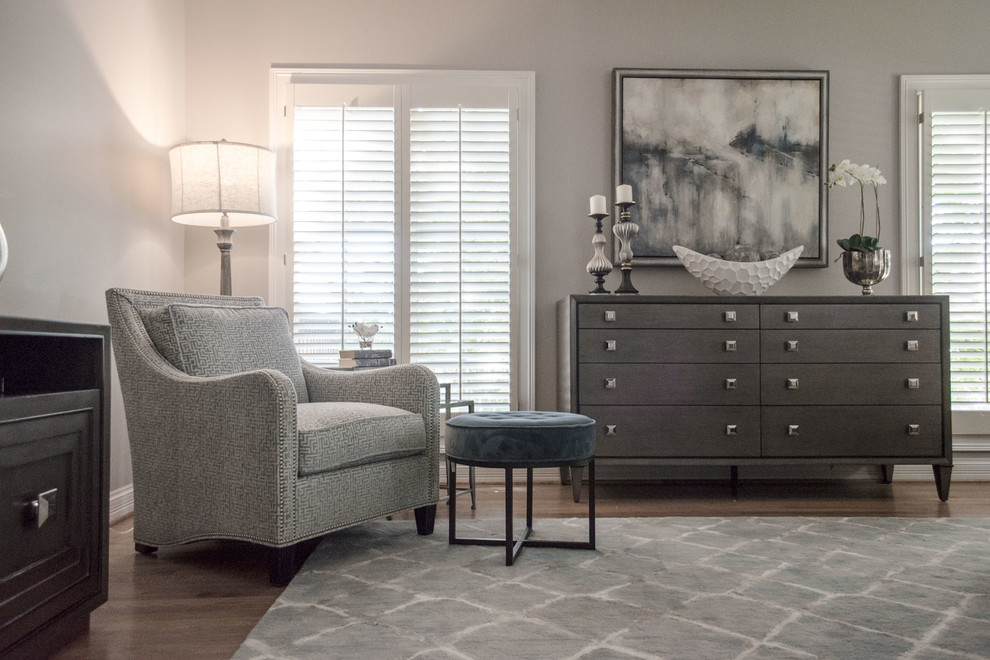Photo of a large classic master and grey and silver bedroom in Louisville with grey walls, medium hardwood flooring, no fireplace and orange floors.