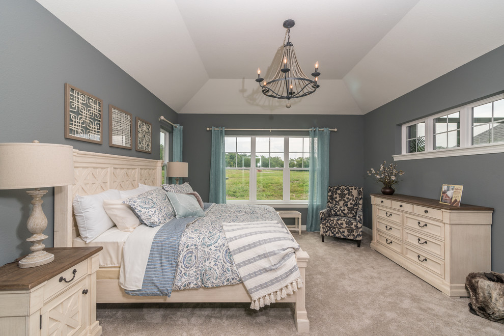 Inspiration for a large classic master bedroom in Milwaukee with grey walls, carpet, no fireplace and beige floors.