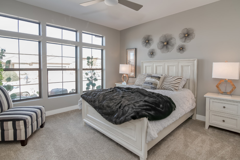 This is an example of a classic guest bedroom in Salt Lake City with grey walls, carpet and grey floors.