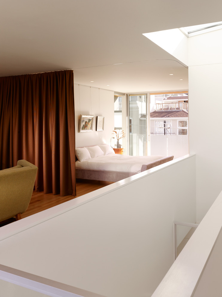Example of a trendy loft-style bedroom design in San Francisco