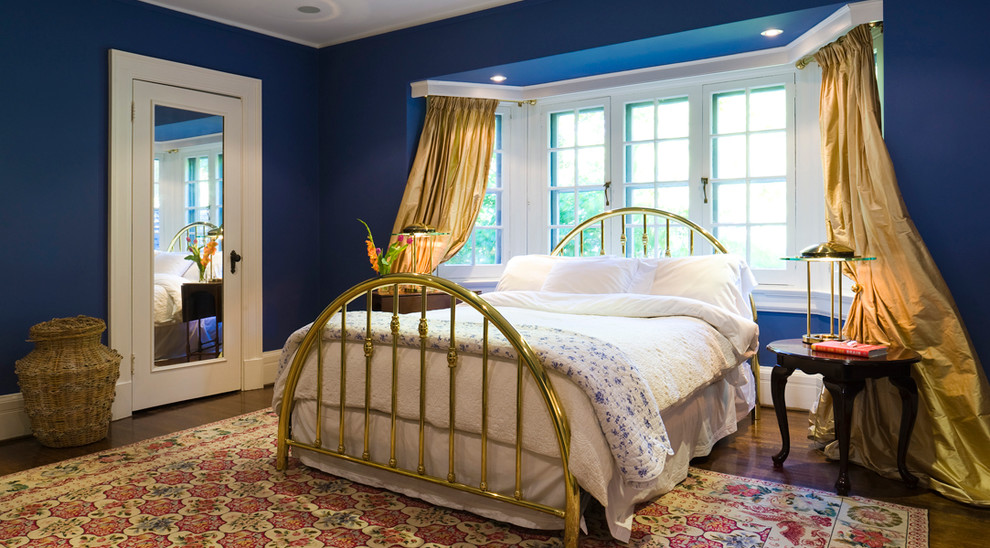 Elegant bedroom photo in Toronto with blue walls
