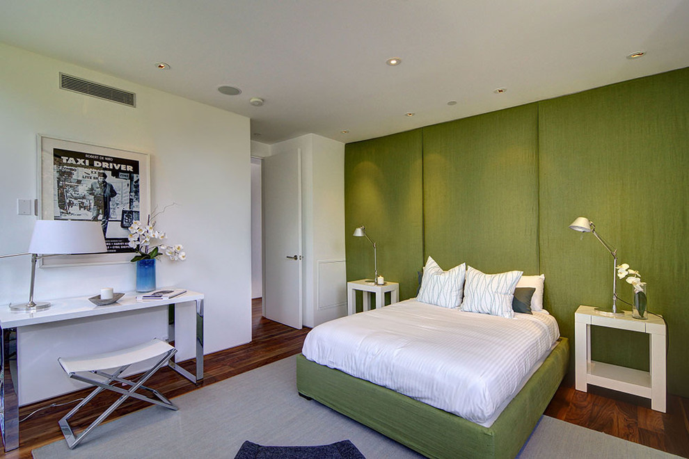 Inspiration for a contemporary bedroom remodel in Los Angeles with green walls