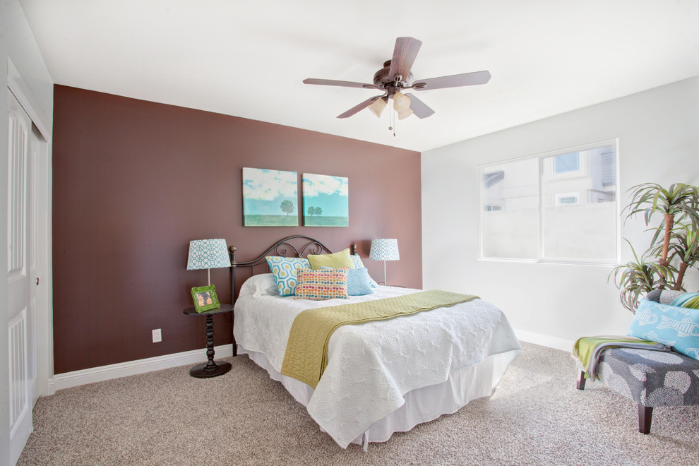 Inspiration for a mid-sized timeless master carpeted bedroom remodel in Orange County with gray walls and no fireplace