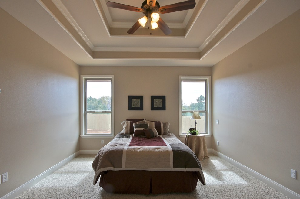 This is an example of a medium sized classic master bedroom in Dallas with beige walls, carpet, no fireplace and grey floors.