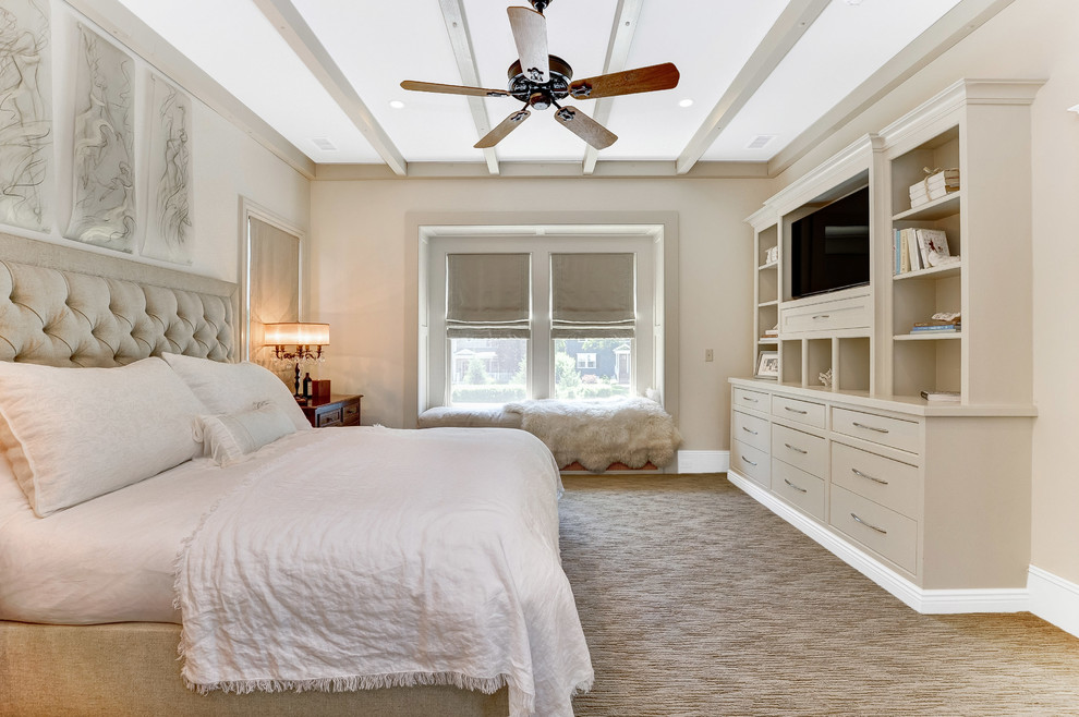 This is an example of a traditional bedroom in New York with beige walls, carpet and beige floors.