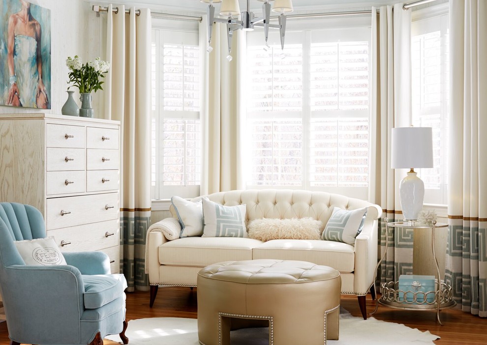 Inspiration for a large classic master bedroom in Atlanta with medium hardwood flooring and white walls.