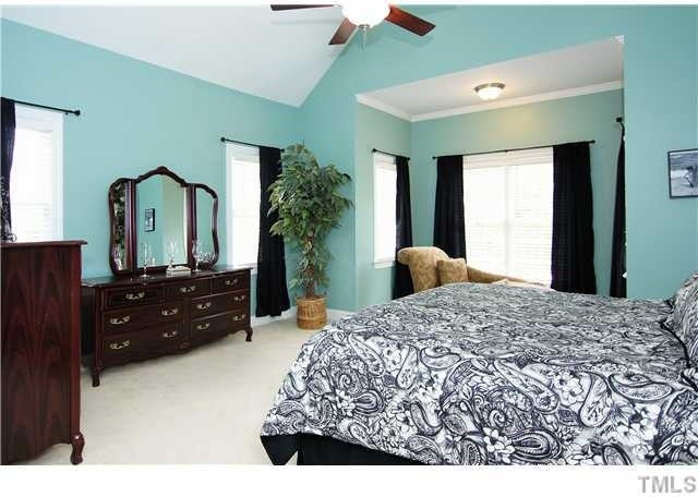 Elegant bedroom photo in Raleigh
