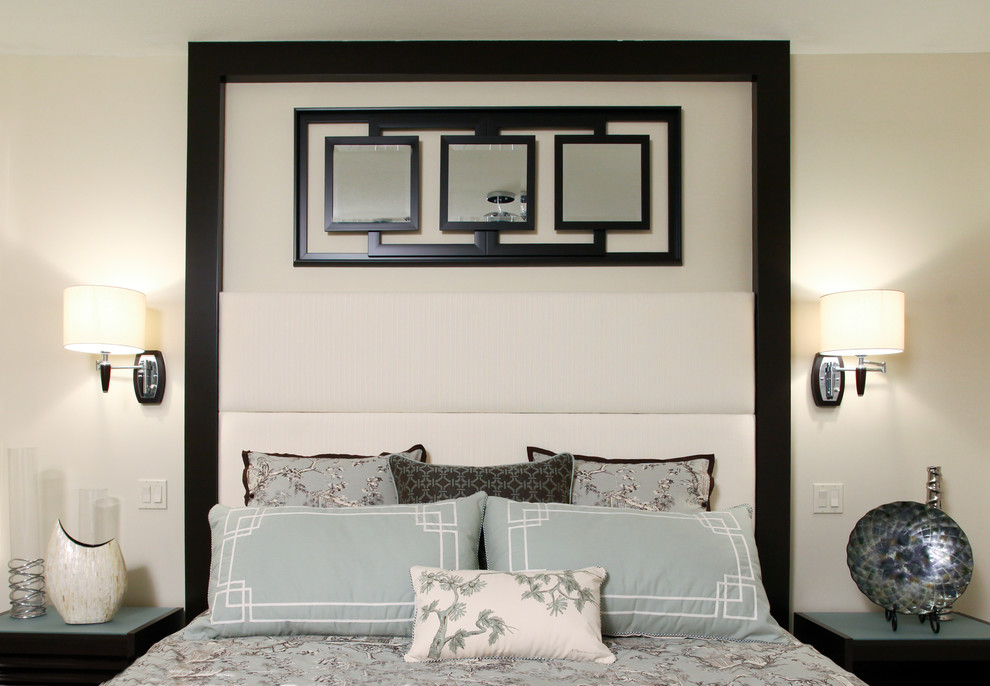 Example of a transitional master dark wood floor bedroom design in Calgary with white walls