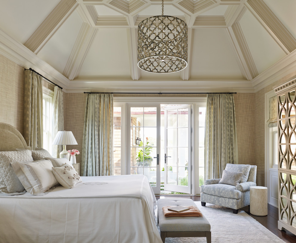 Traditional bedroom in Jacksonville with beige walls and dark hardwood flooring.