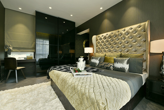 Design ideas for a contemporary master bedroom in Mumbai with grey walls and dark hardwood flooring.