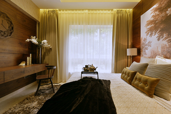 Inspiration for a small contemporary master bedroom in Mumbai with white walls.