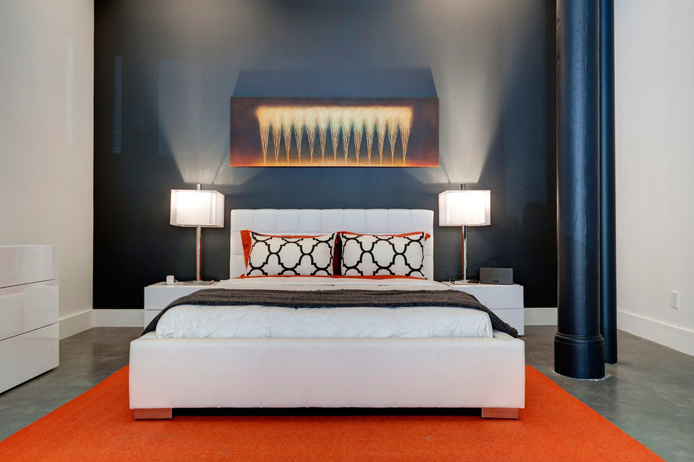 Bedroom - contemporary concrete floor bedroom idea in Montreal