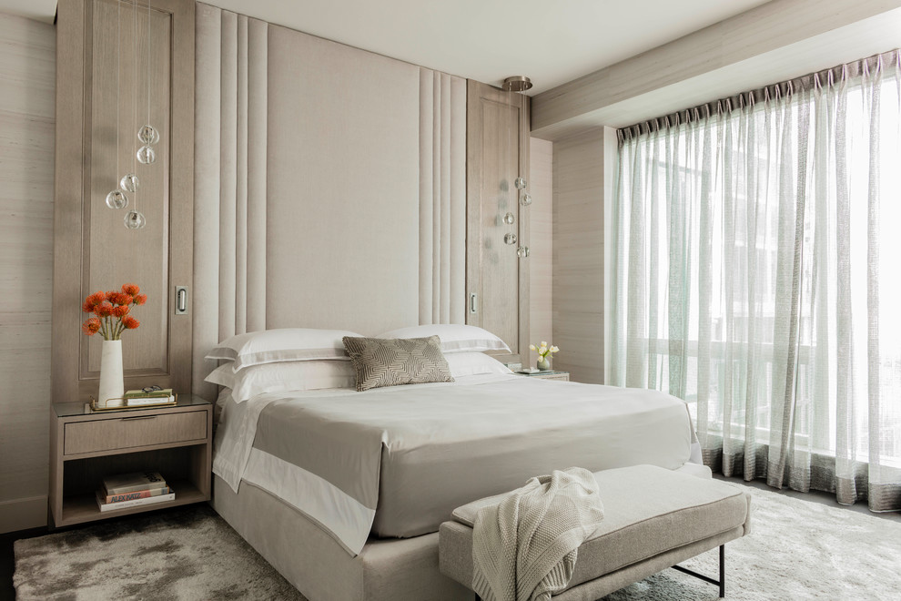 Modelo de dormitorio contemporáneo con paredes beige