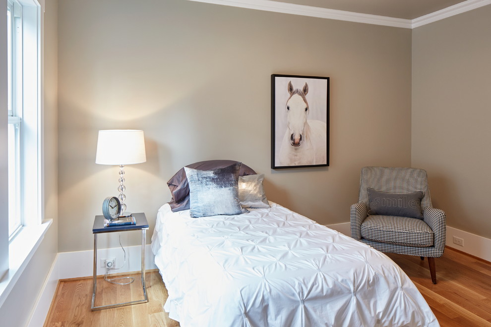 Mid-sized transitional guest light wood floor bedroom photo in Portland with gray walls