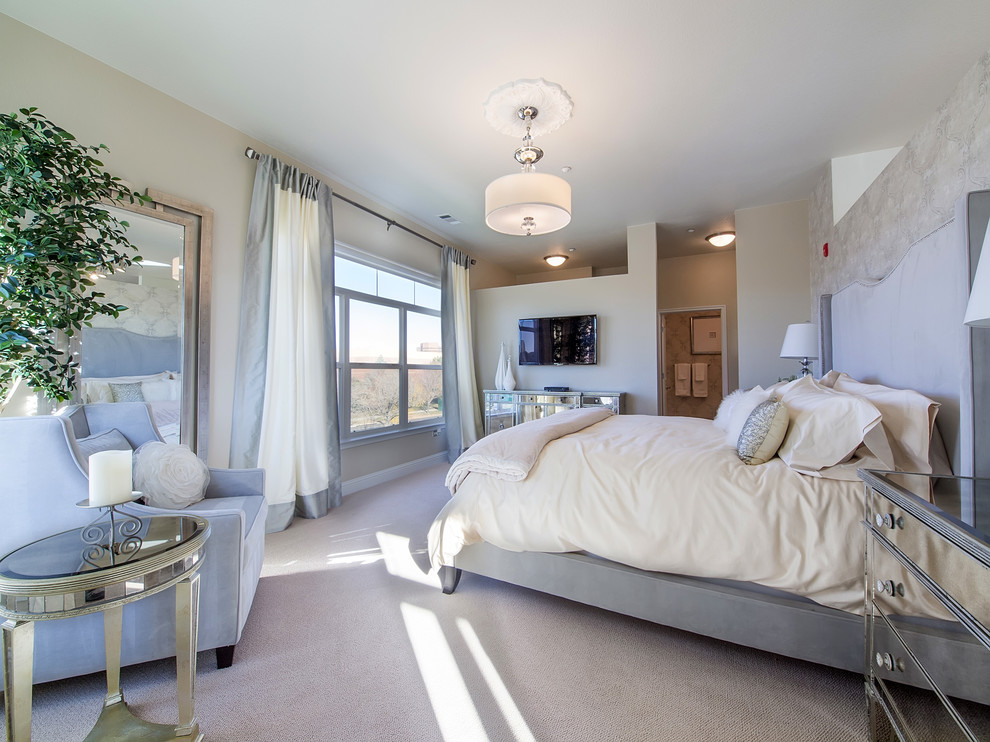 Bedroom - contemporary carpeted bedroom idea in Denver with beige walls