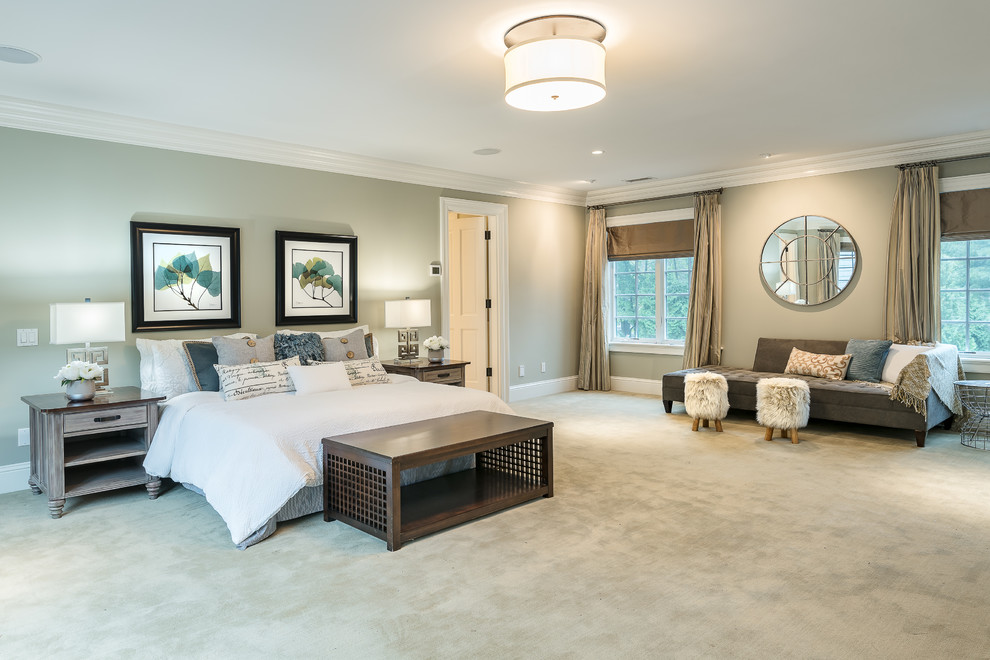 This is an example of an expansive contemporary master bedroom in Boston with beige walls, carpet, no fireplace and beige floors.