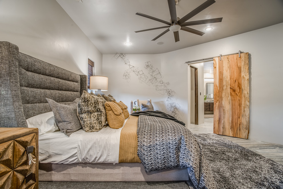 This is an example of a contemporary bedroom in Austin.