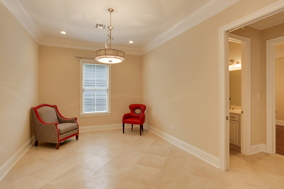 Inspiration for a large timeless ceramic tile bedroom remodel in New Orleans with beige walls