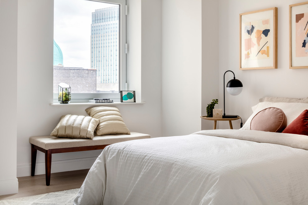 ニューヨークにある北欧スタイルのおしゃれな寝室 (白い壁、暖炉なし)