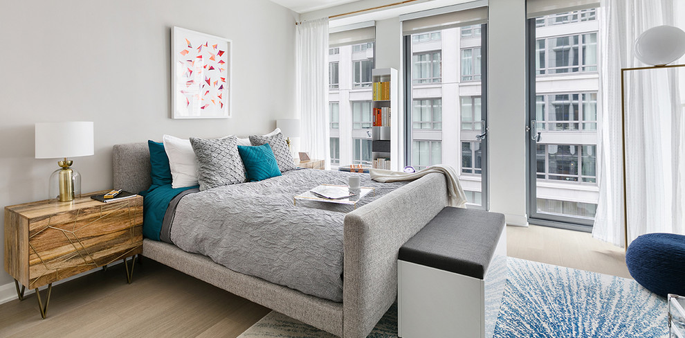 Design ideas for a contemporary bedroom in New York with grey walls.