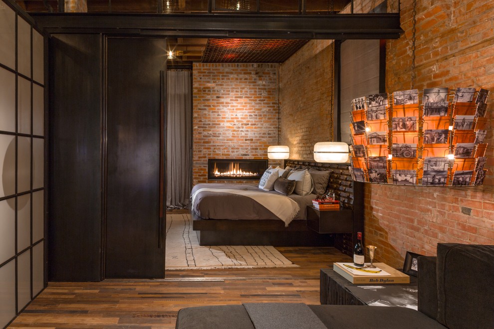 Inspiration for an industrial bedroom remodel in Denver