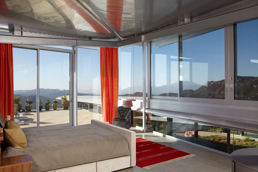 Trendy concrete floor bedroom photo in Los Angeles