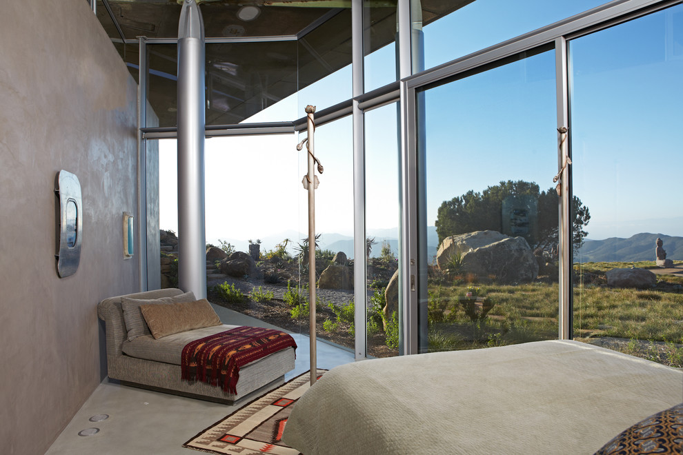 Bedroom - contemporary concrete floor and gray floor bedroom idea in Los Angeles