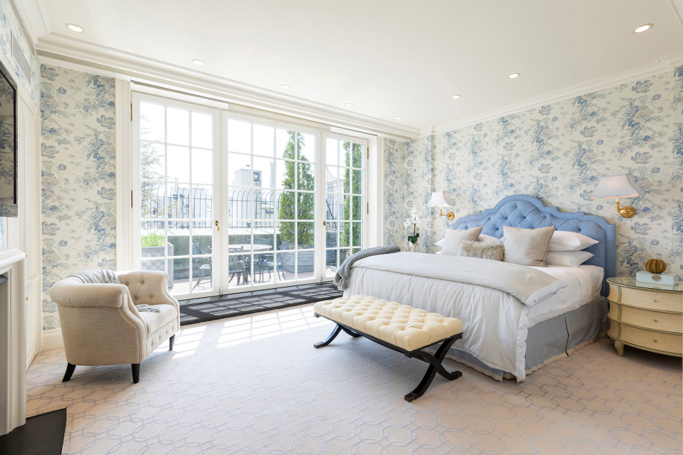 This is an example of a classic bedroom in New York with blue walls, carpet, beige floors and wallpapered walls.
