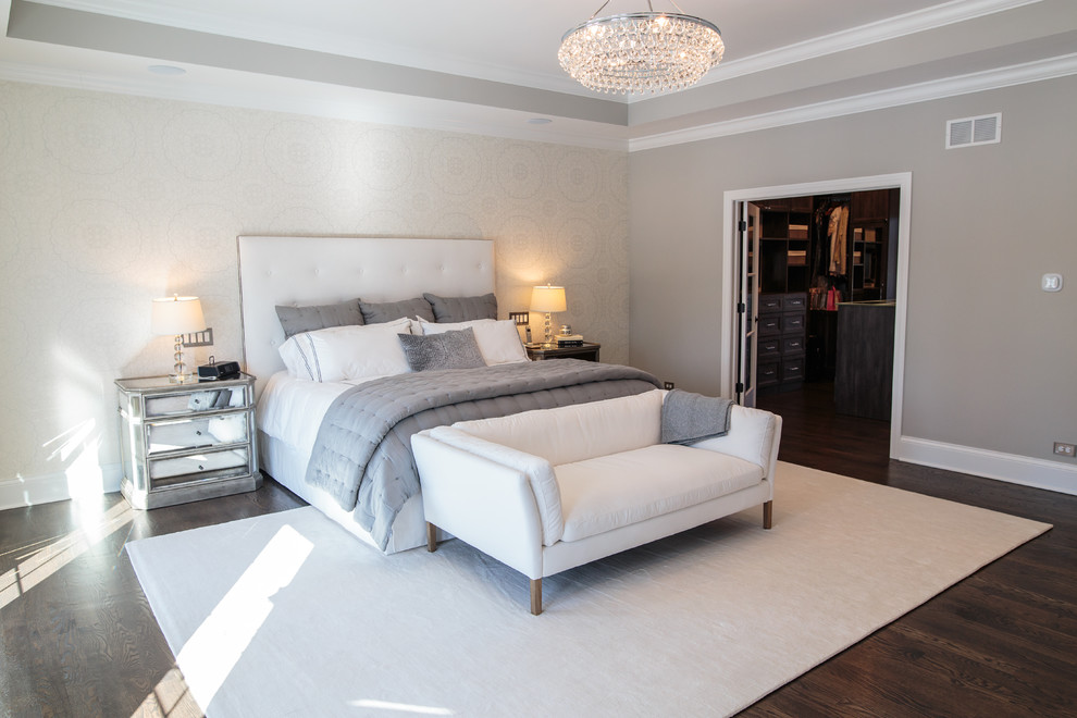 Inspiration for a medium sized traditional master bedroom in Chicago with grey walls, carpet, a ribbon fireplace and a stone fireplace surround.