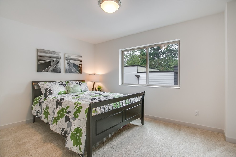 Example of a minimalist guest carpeted bedroom design in Seattle