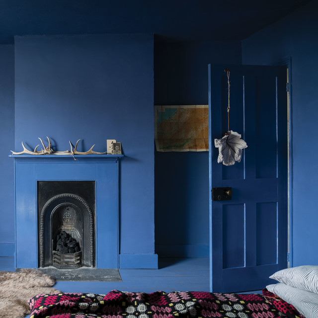 A bedroom painted in Pitch Blue No.220 by Farrow & Ball - Eclectic