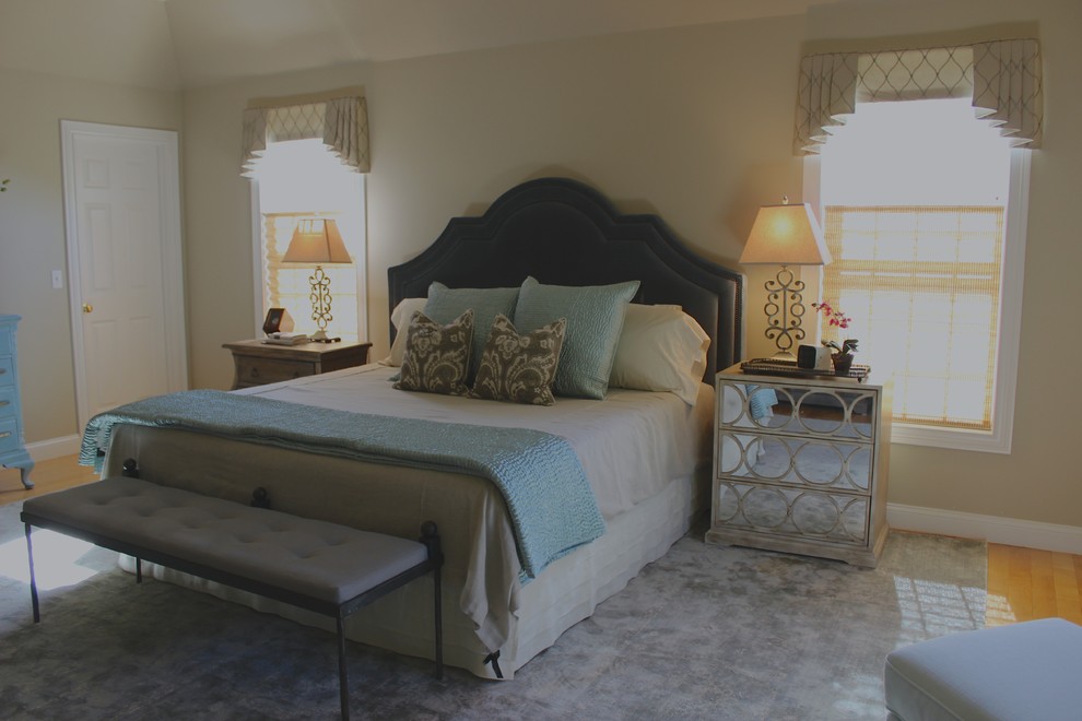 Inspiration for a large classic master bedroom in Other with beige walls, light hardwood flooring and no fireplace.
