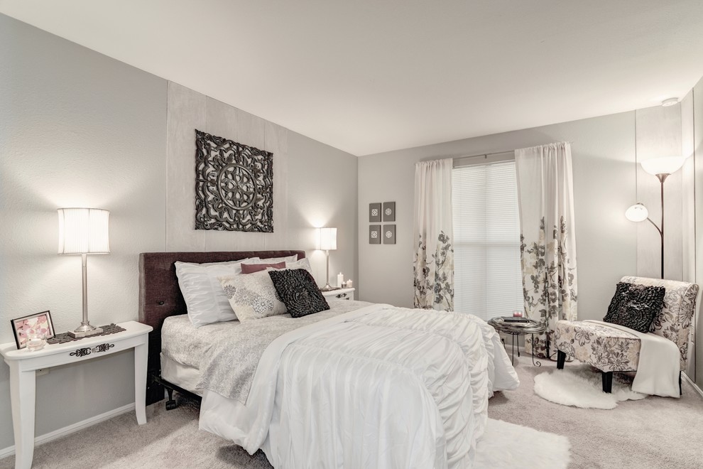 Example of a mid-sized transitional carpeted bedroom design in Philadelphia with gray walls and no fireplace