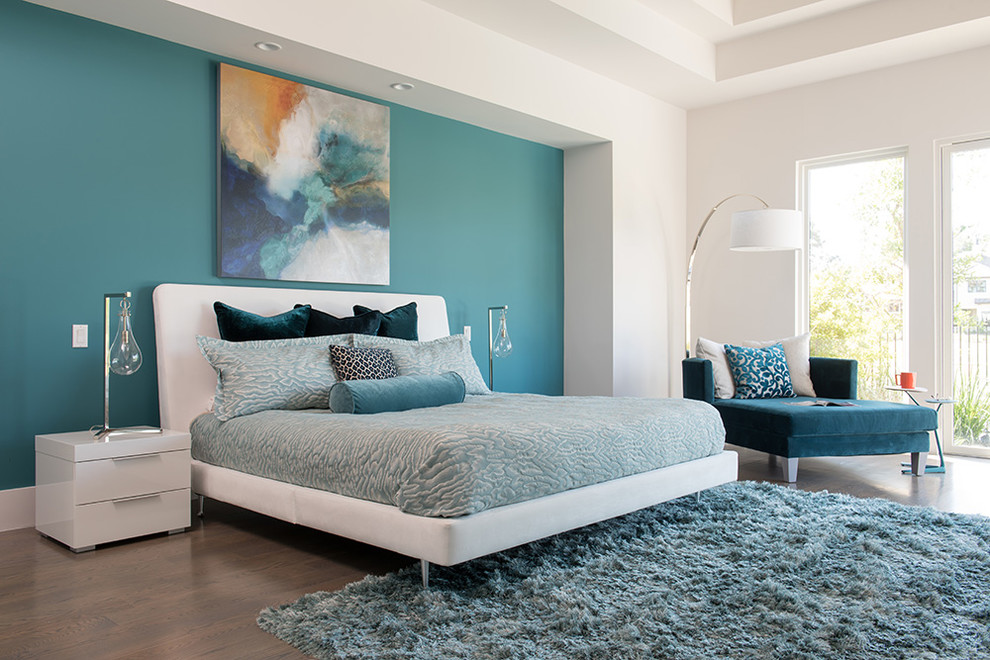 Example of a mid-sized trendy master bedroom design in Houston with blue walls