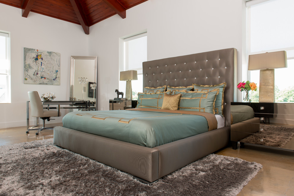 This is an example of a contemporary bedroom in Houston.