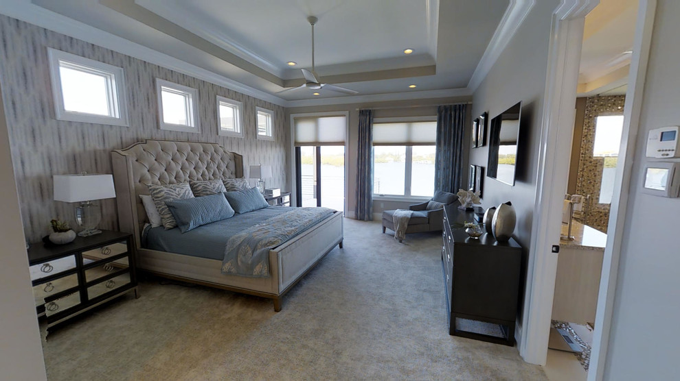 This is an example of a large classic master bedroom in Other with beige walls, carpet, no fireplace and grey floors.